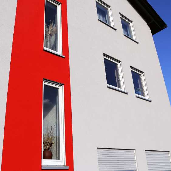 Refection d'une façade d'immeuble à Millau